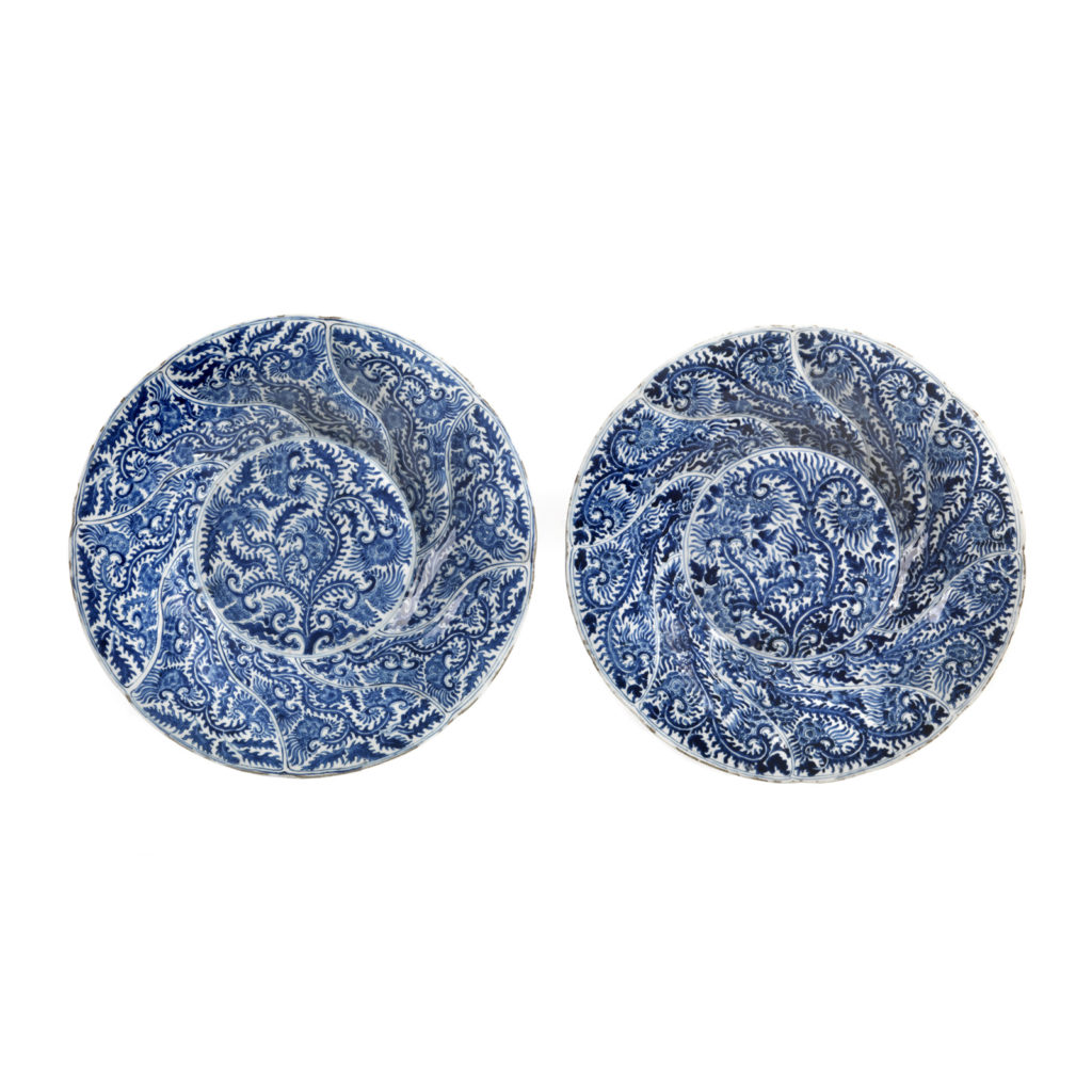 A LARGE PAIR OF BLUE AND WHITE SPIRAL-MOLDED DISHES KANGXI PERIOD (1662-1722)